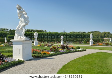 Garden with sculptures in Herrenhausen Gardens, Hanover, Germany. Royal Gardens at Herrenhausen are one of the most distinguished baroque formal gardens of Europe