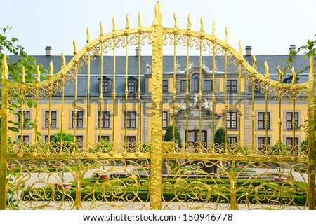 Golden gate at palace of Herrenhausen Gardens, Hannover, Germany. Royal Gardens at Herrenhausen are one of the most distinguished baroque formal gardens of Europe