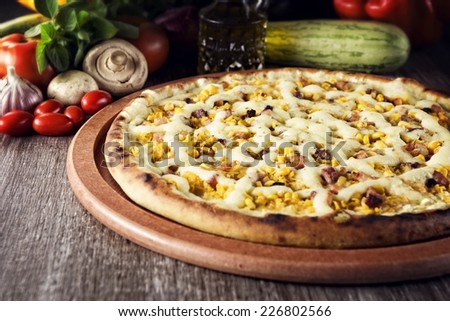 Chicken pizza with bacon