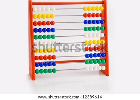 Abacus with red, yellow,blue,green and white in it.