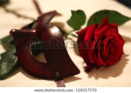 Venice carnival mask and red rose composition / Venice mask and rose