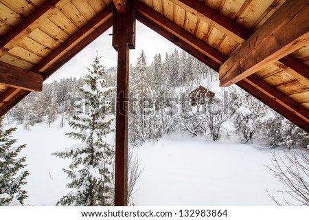 View from the mountain chalet window / Haute Savoie, France - view from the wooden ski chalet window