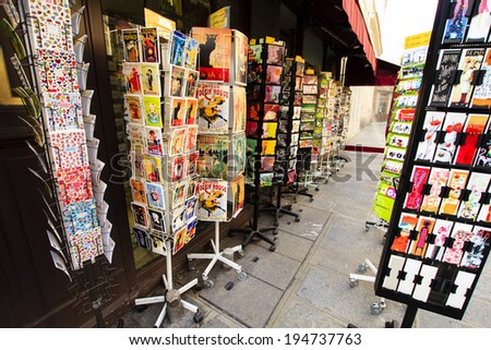 PARIS, FRANCE - MARCH 5 : Racks full of tourist postcards in the open gift shop in Paris, France on March 5th, 2013 in Paris, France