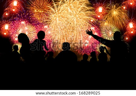 Group Of People Silhouette Enjoy Watching Firework Show In The Night Sky