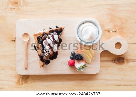 Set cake on vintage wooden table. Top view