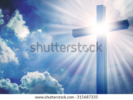 The Cross with bright sun and clouds in the background