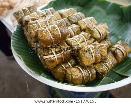 Bunch of rice in Thailand.Thai dessert made from banana and glutinous rice, wrap with banana leaf