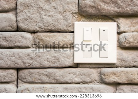 Switches with brick wall on the background