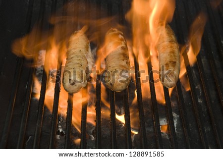 Hot Italian Sausage BBQ with flames