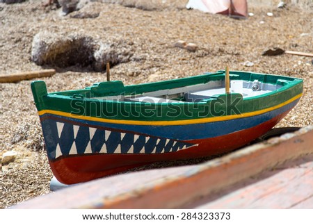 Fishing boat with shark\'s teeth in Port of Trapani (Sicily, Italy)