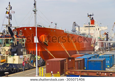 Oil tanker moored near an oil silo in Port of Antwerp, Belgium