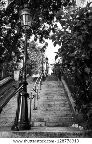 A Very Long Staircase With An Old Street Lamp In Montmartre, Paris, France. Black And White