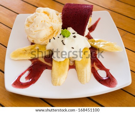 Swiss roll and jam with ice-cream