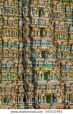MADURAI, INDIA - MARCH 3: Meenakshi temple - one of the biggest and oldest Indian temples on March 3, 2013 in Madurai, Tamil Nadu, India. The 14 gateway towers called gopura ranging from 45 to 50m.