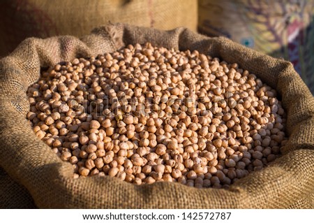 Burlap sack with chickpeas close-up