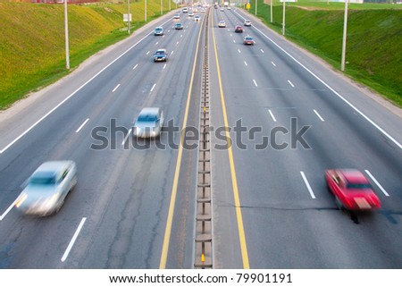 Cars on a road with motion blurred effect