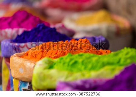 Colorful piles of powdered dyes used for Holi festival in India