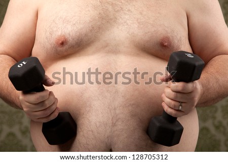 Overweight white male holding weights