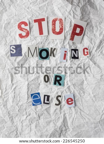 ransom note carrying the text stop smoking or else. health risk of smoking concept.