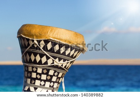 ethnic drum with a sea background. darbuka. traditional Egyptian drum