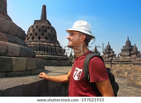 man in hat the hat in Borobudur temple