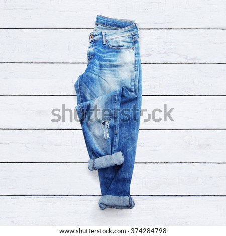 jeans on a white wooden background
