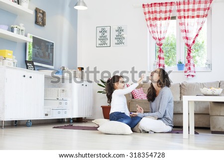Mom and daughter in the living room