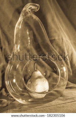 Pear in a Pear Shape Glass Vase with antique filter