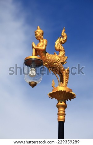 Kinaree is the animal in Thai myth. Street light in most important area uses Kinaree as a gold abstract sculpture lamp hanger.