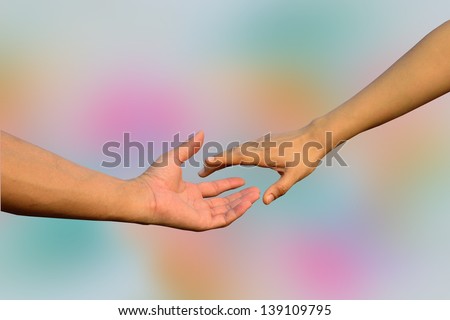 Handshaking, hands in hands, reaching, stretching hands,