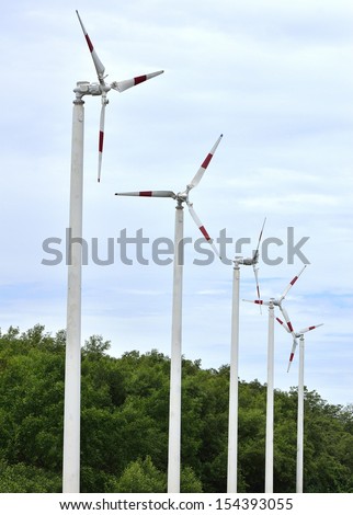 Line up of Environmental Friendly Windmills produce clean energy for electricity generation