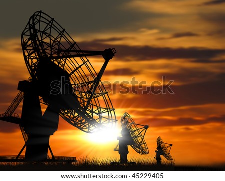 satellite dishes over sunset