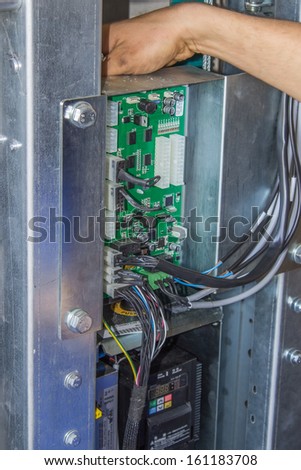Installing elevator control panel, elevator parts installation