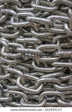 coiled steel chain background, metal chain background