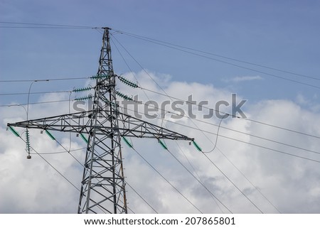 Electricity pylon supporting wires for electrical power distribution. Utility pole with lot of wires.