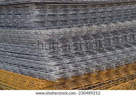 Welded iron mesh panels for reinforced concrete background at the construction site. Bar mat reinforcement mesh.