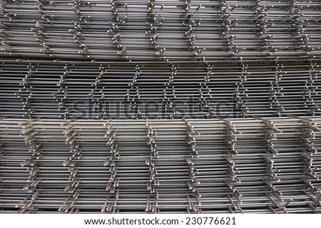 Reinforcement steel mesh background at the construction site. Mesh and bar.