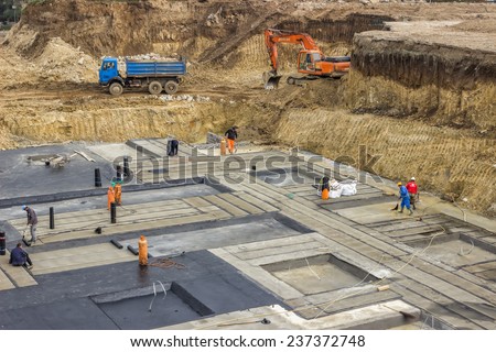 BELGRADE, SERBIA - OCTOBER 30: Foundation insulation to reduce slab heat losses and waterproofing. At construction site in October 2014.