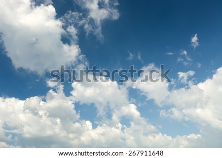 Blue sky with white clouds on blue style.