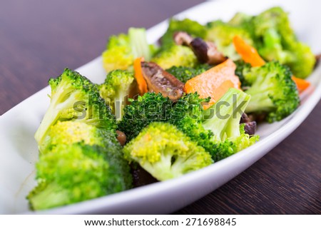 Stir-Fried Broccoli Broccoli white dish.