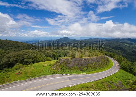 The road curves up Doi Inthanon