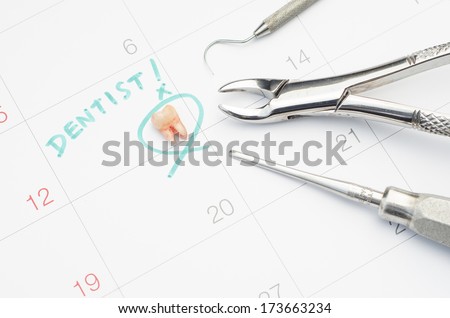 A note of  a dentist appointment on a calendar, dental check up