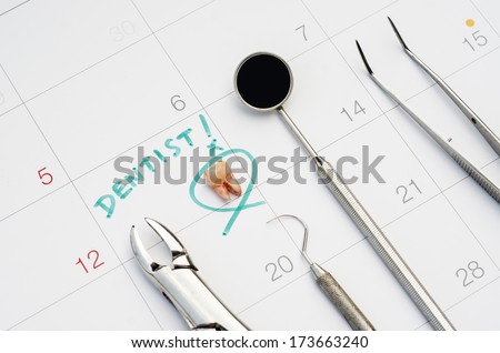 A note of  a dentist appointment on a calendar, dental check up