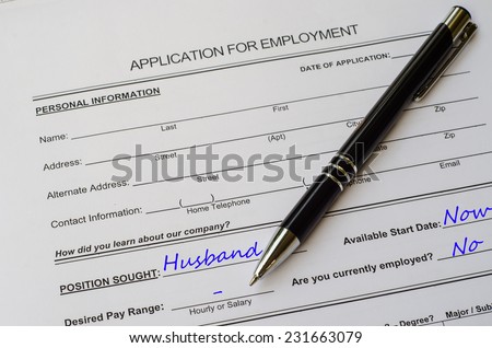 A job application jobs sitting with a pen, applying for a husband
