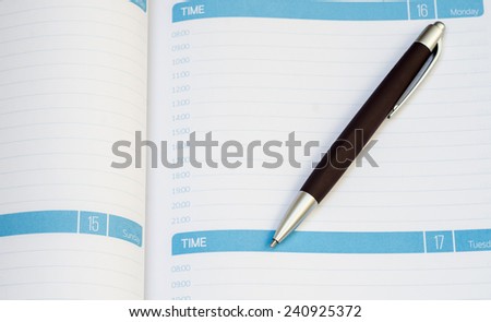Planner with pen