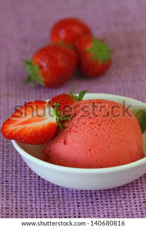 Strawberry sorbet and fresh strawberry