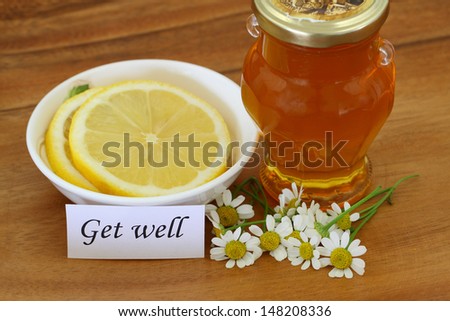 Get well note with chamomile flowers, honey and lemon