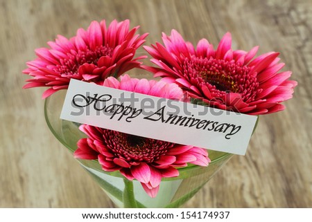 Happy Anniversary card with pink gerbera daisies in martini glass