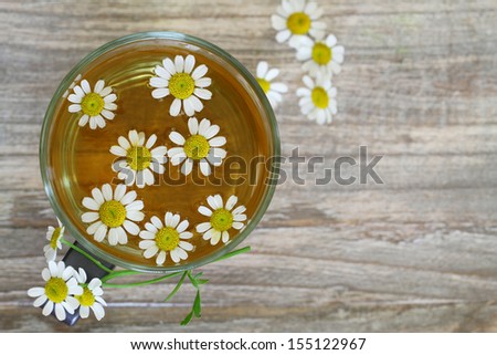 Chamomile tea, chamomile flowers with copy space