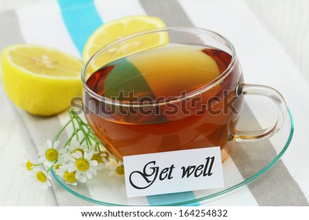Get well card with cup of chamomile tea and lemon